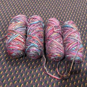 4. skeins 3. ply multi tone variegated yarn